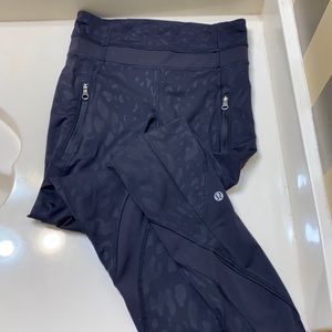 Black animal print lululemon leggings with pockets